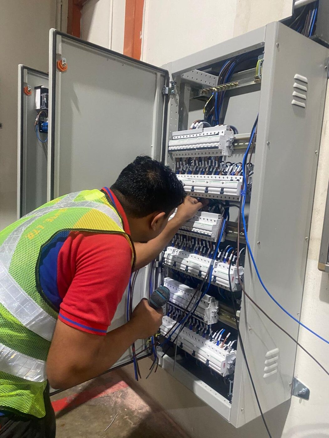 Future Core Builders electrician terminating a distribution board